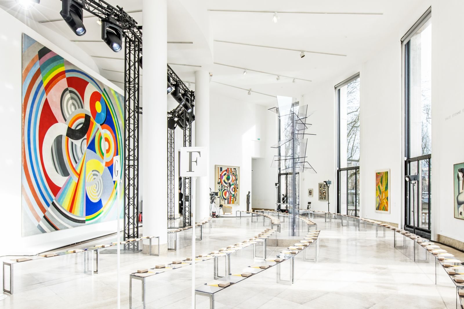 Fashion show set inside a museum gallery